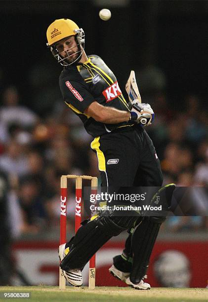 Wes Robinson of the Warriors avoids a bouncer during the Twenty20 Big Bash match between the Queensland Bulls and the Western Australian Warriors at...