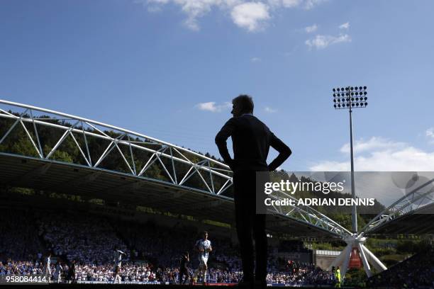 Arsenal's French manager Arsene Wenger looks on during the English Premier League football match between Huddersfield Town and Arsenal at the John...