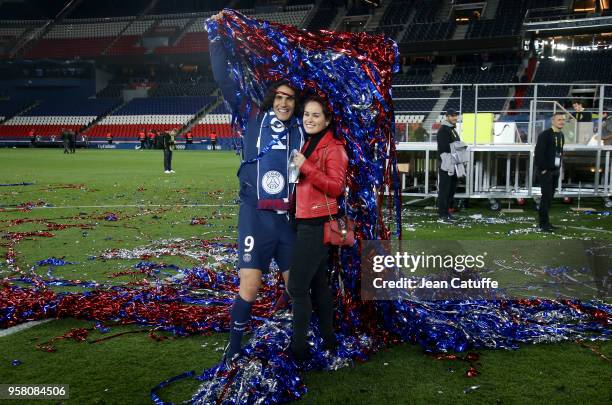 Edinson Cavani of PSG and his girlfriend Jocelyn Burgardt celebrate during the French Ligue 1 Championship Trophy Ceremony following the Ligue 1...