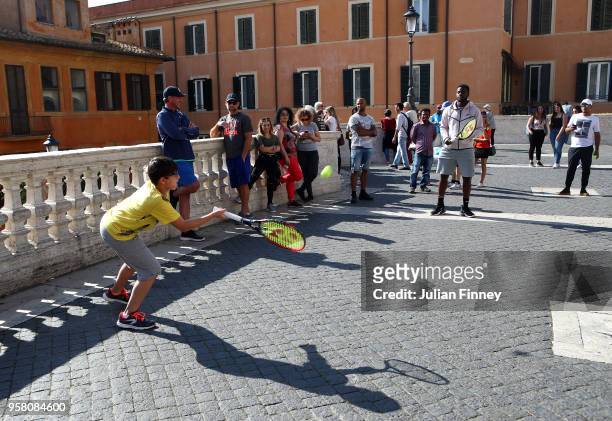 Frances Tiafoe of USA plays tennis by the Spanish Steps during day one of the Internazionali BNL d'Italia 2018 tennis at Foro Italico on May 13, 2018...