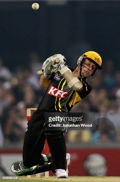Luke Ronchi of the Warriros avoids a bouncer during the Twenty20 Big Bash match between the Queensland Bulls and the Western Australian Warriors at...