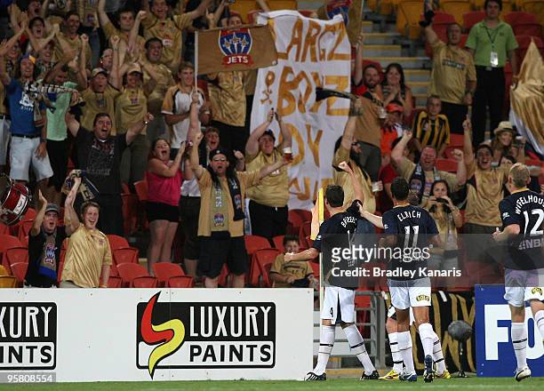 Michael Bridges of the Jets celebrates with fans after scoring his teams second goal during the round 23 A-League match between the Brisbane Roar and...