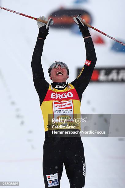 Justyna Kowalczyk of Poland celebrates her victory in the Women's 10km Cross Country Skiing during the FIS World Cup on January 16, 2010 in Otepaeae,...