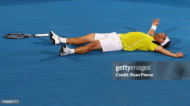 Marcos Baghdatis of Cyrprus celebrates winning match point in his men's final match against Richard Gasquet of France during day seven of the 2010...