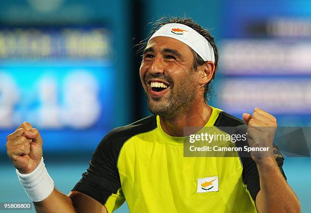 Marcos Baghdatis of Cyprus celebrates championship point in his men's final against Richard Gasquet of France during day seven of the 2010 Medibank...