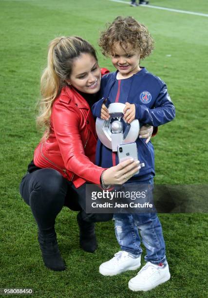 Jocelyn Burgardt, girlfriend of Edinson Cavani of PSG and Cavani's son Lucas Cavani celebrate during the French Ligue 1 Championship Trophy Ceremony...
