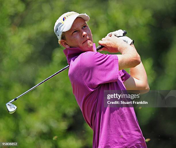 Marcel Siem of Germany plays his tee shot on the fifth hole during the third round of the Joburg Open at Royal Johannesburg and Kensington Golf Club...