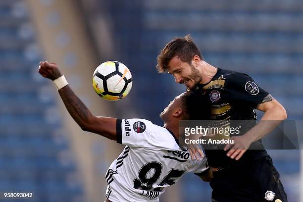 Cyle Larin of Besiktas in action against Anil Karaer of Osmanlispor during Turkish Super Lig match between Osmanlispor and Besiktas at Yenikent...