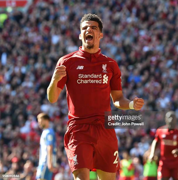 Dominic Solanke of Liverpool celebrates after scoring the second goal during the Premier League match between Liverpool and Brighton and Hove Albion...