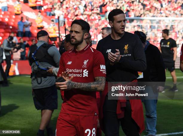 Danny Ings and Danny Ward of Liverpool shows his appreciation to the fans at the end of the Premier League match between Liverpool and Brighton and...