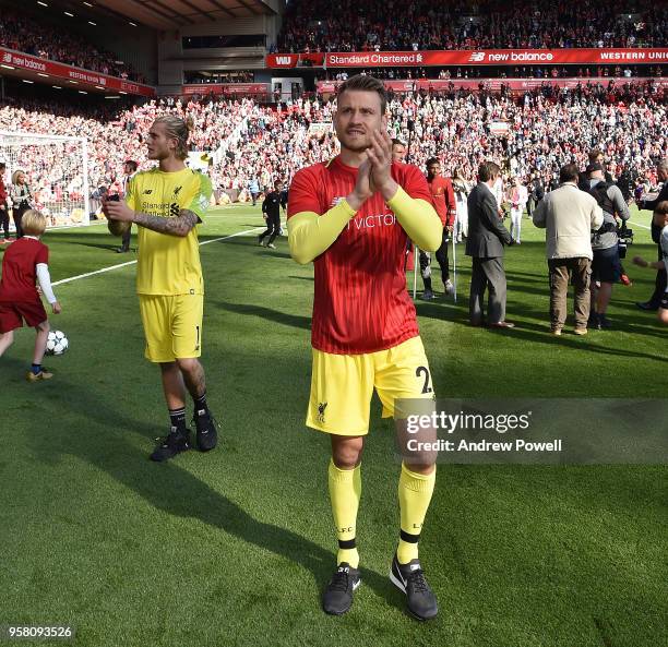 Simon Mignolet and Loris Karius of Liverpool shows his appreciation to the fans at the end of the Premier League match between Liverpool and Brighton...