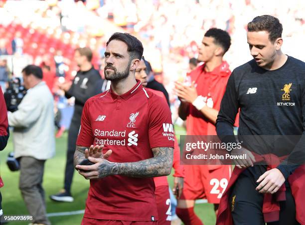 Danny Ings and Danny Ward of Liverpool shows his appreciation to the fans at the end of the Premier League match between Liverpool and Brighton and...