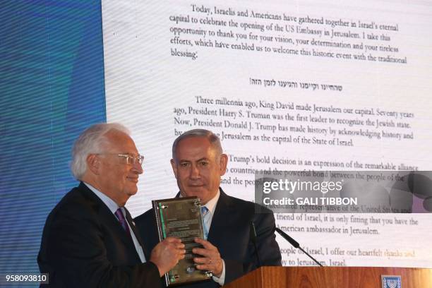 Israeli Prime Minister Benjamin Netanyahu and the US Ambassador to Israel David Friedman attend the official reception on the occasion of the opening...