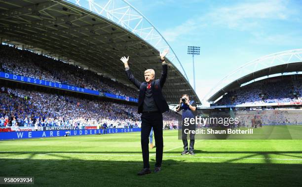 Arsenal manager Arsene Wenger acknowledges the Arsenal fans before the Premier League match between Huddersfield Town and Arsenal at John Smith's...