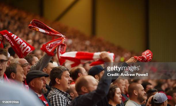 Fans of Liverpool during the Premier League match between Liverpool and Brighton and Hove Albion at Anfield on May 13, 2018 in Liverpool, England.
