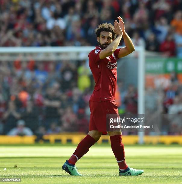 Moahmed Salah of Liverpool shows his appreciation to the fans at the end of the Premier League match between Liverpool and Brighton and Hove Albion...