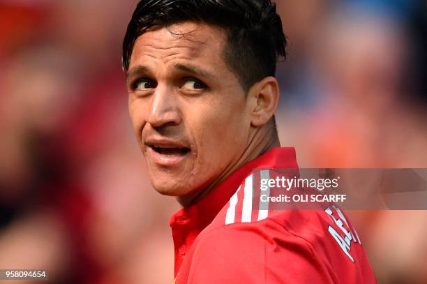 Manchester United's Chilean striker Alexis Sanchez reacts during the English Premier League football match between Manchester United and Watford at...