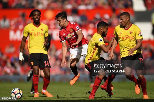 Manchester United's Chilean striker Alexis Sanchez takes on Watford's English midfielder Nathaniel Chalobah , Watford's English-born Jamaican...