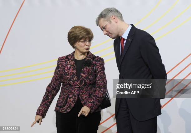 Portuguesse Minister for the Enviroment and Spatial Planning Dulce Passaro and German Minister of Environment Norbert Roettgen chat before the family...