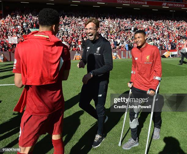 Jurgen Klopp manager of Liverpool laughing with Dominic Solanke during the Premier League match between Liverpool and Brighton and Hove Albion at...
