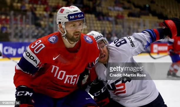 Daniel Sorvik of Norway and Cam Atkinson of United States battle for position during the 2018 IIHF Ice Hockey World Championship Group B game between...