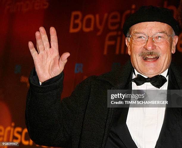 German director Volker Schloendorff poses on the red carpet prior to the awards ceremony of the Bavarian Film Prize on January 15, 2010 at the...