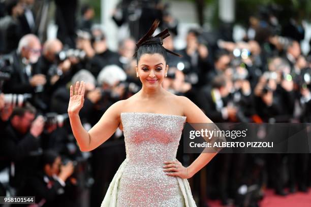 Indian actress and model Aishwarya Rai poses as she arrives on May 13, 2018 for the screening of the film "Sink Or Swim " at the 71st edition of the...