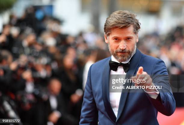 Danish actor Nikolaj Coster-Waldau poses as he arrives on May 13, 2018 for the screening of a remastered version of the film "2001: A Space Odyssey"...