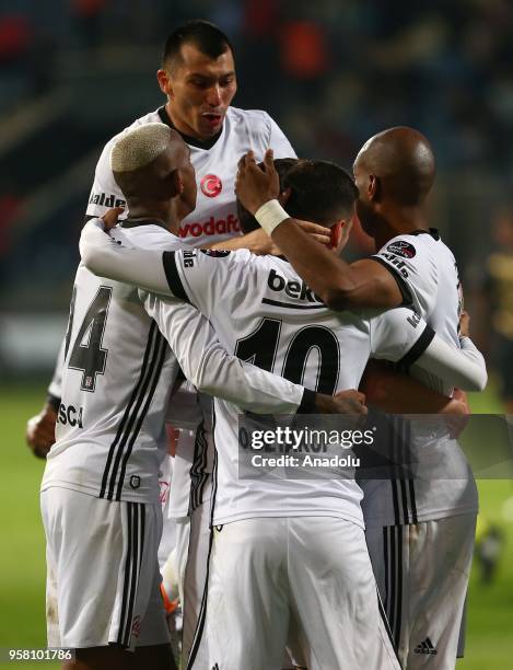 Oguzhan Ozyakup, Talisca and Gary Medel of Besiktas celebrate after scoring a goal during Turkish Super Lig match between Osmanlispor and Besiktas at...