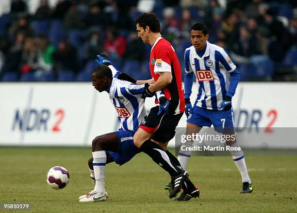 Mario Eggimann of Hannover 96 and Adrian Ramos of Berlin compete for the ball during the Bundesliga match between Hannover 96 and Hertha BSC Berlin...