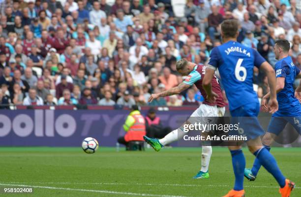 Marko Arnautovic of West Ham United scores during the Premier League match between West Ham United and Everton at London Stadium on May 13, 2018 in...