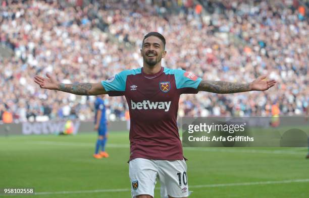 Manuel Lanzini of West Ham United celebrates scoring his second goal during the Premier League match between West Ham United and Everton at London...