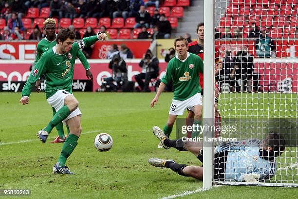 Tim Hoogland of Mainz scores the first goal past goalkeeper Rene Adler of Leverkusen during the Bundesliga match between Bayer Leverkusen and FSV...