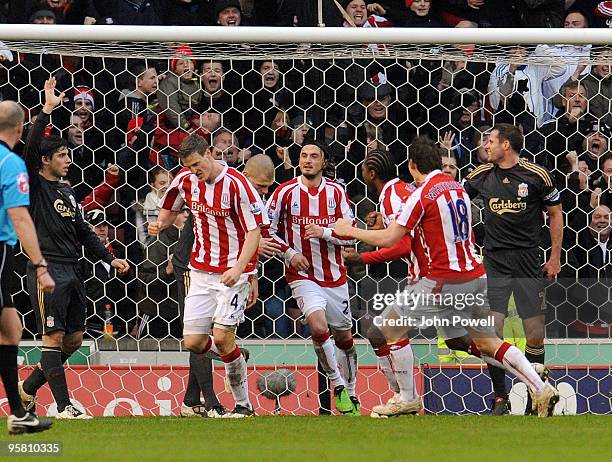 Robert Huth of Stoke celebrates after scoring an equalizing goal against Liverpool during the Barclays Premier League match between Stoke City and...