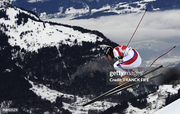 France's David Poisson jumps during the FIS World Cup Men's Downhill in Wengen on January 16, 2010. AFP PHOTO / FRANCK FIFE