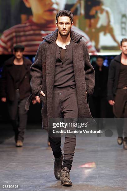Model walks the runway during the Dolce & Gabbana Milan Menswear Autumn/Winter 2010 show on January 16, 2010 in Milan, Italy.