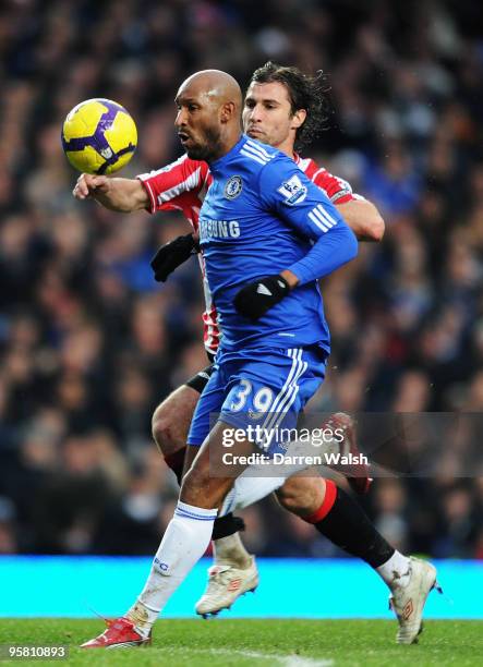 Nicolas Anelka of Chelsea holds off the challenge of Lorik Cana of Sunderland during the Barclays Premier League match between Chelsea and Sunderland...