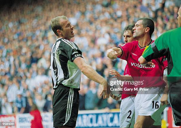 Man Utd Captain Roy Keane takes a swing at Newcastle captain Alan Shearer during the FA Barclaycard Premiership match between Newcastle United and...