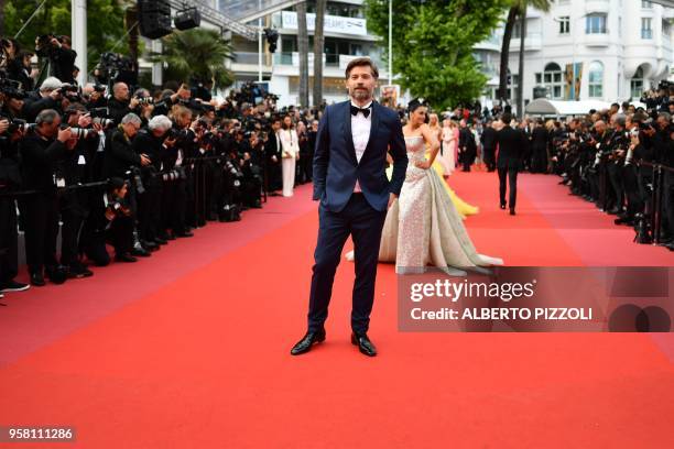 Danish actor Nikolaj Coster-Waldau poses as arrives on May 13, 2018 for the screening of the film "Sink Or Swim " at the 71st edition of the Cannes...