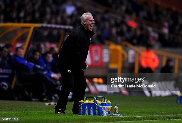 Manager of Wolves Mick McCarthy shouts instructions during the Barclays Premier League match between Wolverhampton Wanderers and Wigan Athletic at...