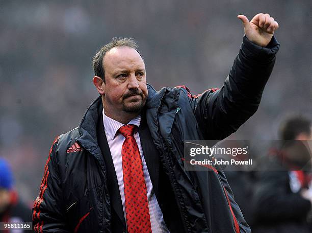 Rafa Benitez manager of Liverpool waves to the fans at the end of the Barclays Premier League match between Stoke City and Liverpool at Britannia...