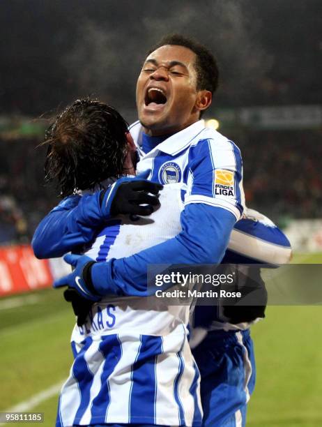 Theofanis Gekas of Berlin celebrates after he scores his team's third goal during the Bundesliga match between Hannover 96 and Hertha BSC Berlin at...