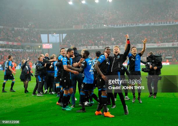 Club Brugge's team celebrate their new champion title after the Jupiler Pro League match Standard de Liege vs Club Brugge, in Liege, on May 13 on day...