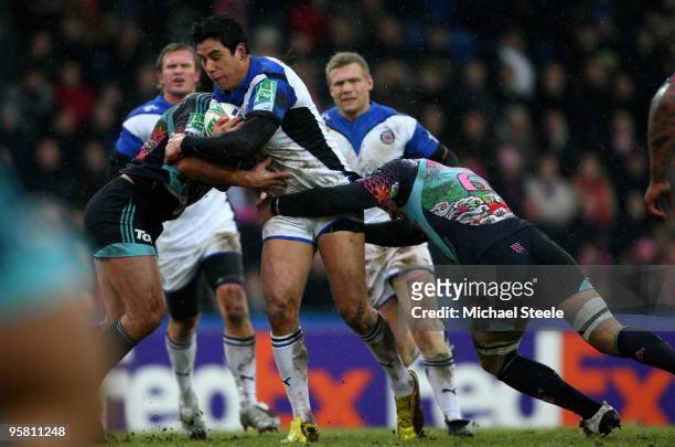 Shontayne Hape of Bath is held up during the Stade Francais v Bath Heineken Cup Pool 4 match at the Stade Jean Bouin on January 16, 2010 in Paris,...