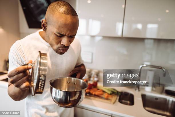 curious of what there is in the pot - lid stock pictures, royalty-free photos & images