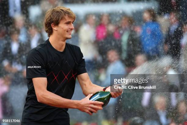 Alexander Zverev of Germany sprays champagne after his straight sets victory against Dominic Thiem of Austria in the mens final during day nine of...