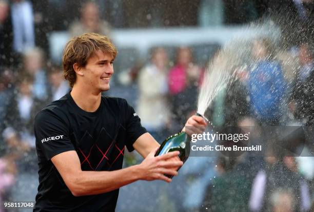 Alexander Zverev of Germany sprays champagne after his straight sets victory against Dominic Thiem of Austria in the mens final during day nine of...