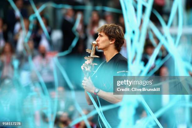 Alexander Zverev of Germany kisses his winners trophy after his straight sets victory against Dominic Thiem of Austria in the mens final during day...