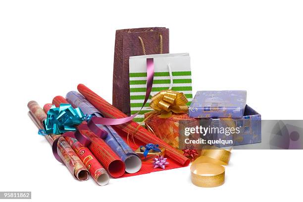 gift wrapper - christmas paper stock pictures, royalty-free photos & images