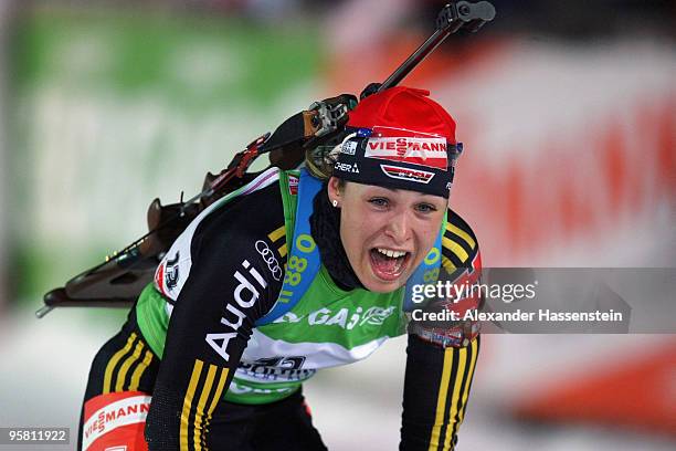 Magdalena Neuner of Germany reacts after winning the third place of the Women Mass Start in the e.on Ruhrgas IBU Biathlon World Cup on January 16,...